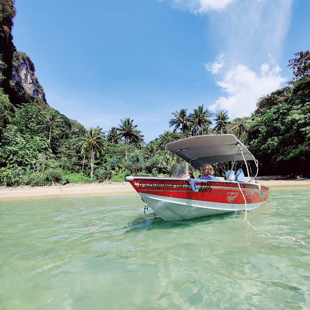 Our speed boat docked at the secluded beach