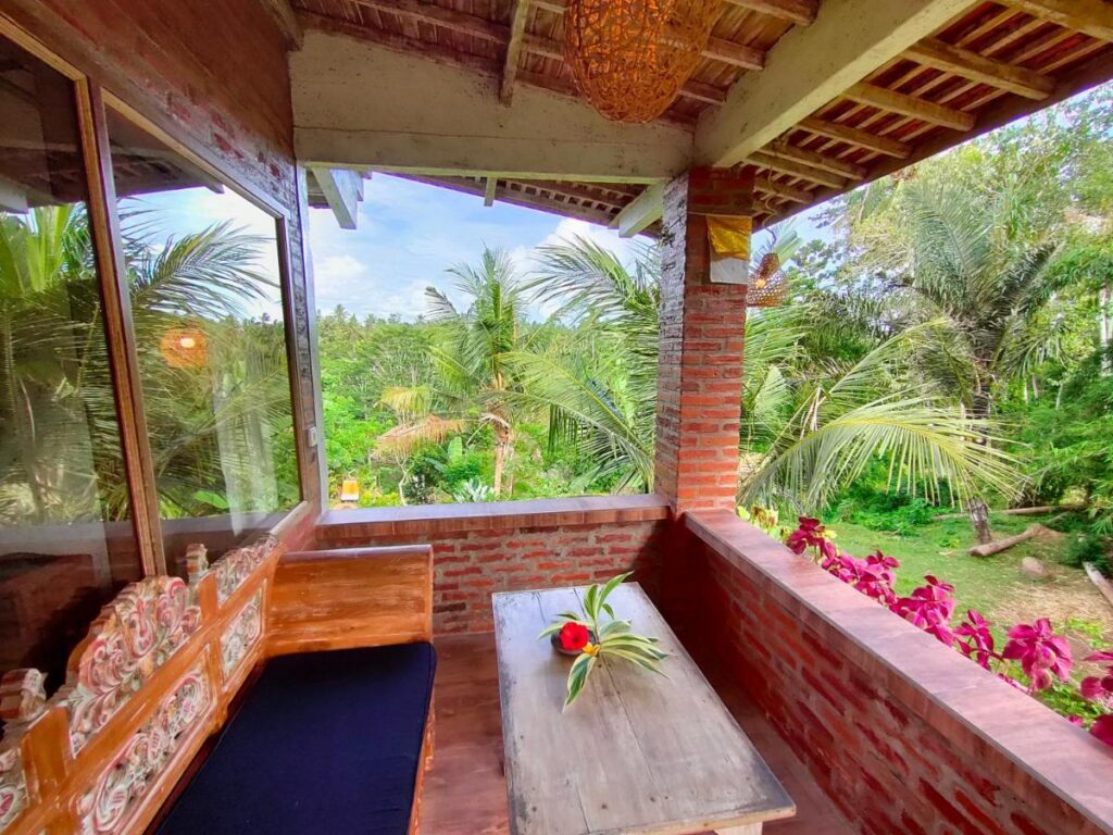 picture of a balcony overlooking a tropical forest